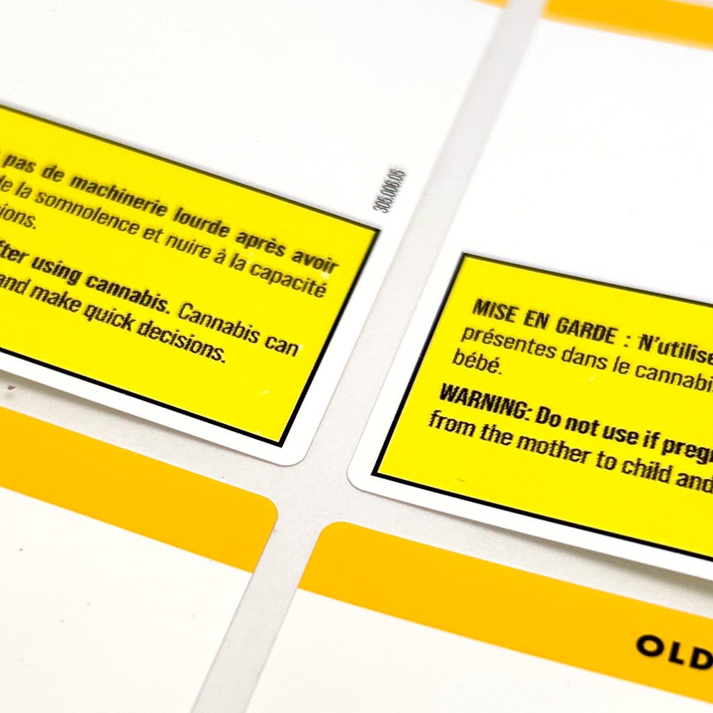 Image d'étiquettes d'avertissement pour produits à base de cannabis, avec des messages en français et en anglais sur fond jaune.